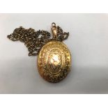 A 9ct locket on a 9ct chain
