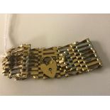 An 8-bar 9ct gate bracelet