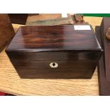 A 19th century rosewood tea caddy