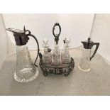 A silver-plated cruet stand;