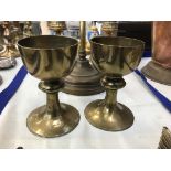 A pair of brass chalices