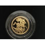 A boxed 1999 proof half sovereign