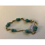 An 18ct turquoise set bracelet