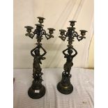 A pair of four-sconce bronze candelabra in Neo-Classical style