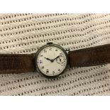 An unusual trench watch, 12 painted in blue, ornate Swiss movement,