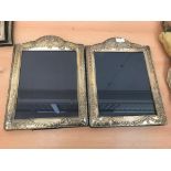 A pair of large HM silver swag and bow photograph frames