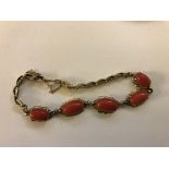 A 14ct coral set bracelet