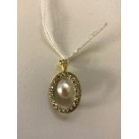 An 18k diamond set annulet with pearl to the centre