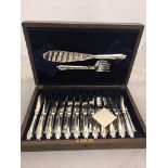 An oak-cased silver-plated fish knife set