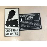 Two cast-iron railway signs