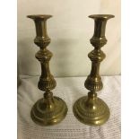 A pair of 19th century brass candlesticks