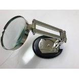 A magnifying glass on stand