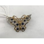 A 9ct diamond and sapphire filigree butterfly brooch