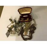 A quantity of vintage dress jewellery: longguards, thimbles,