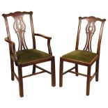 A set of six 18th century mahogany dining chairs comprising two armchairs and four dining chairs