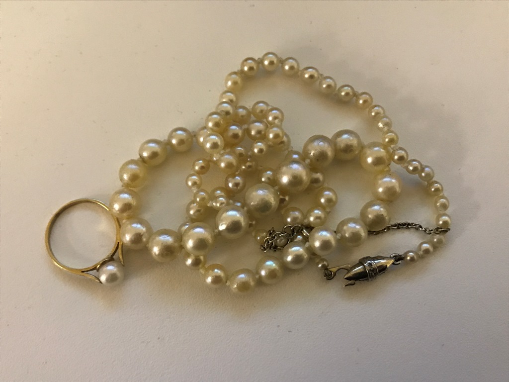 A 9ct pearl ring and necklace