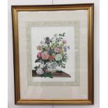 A watercolour depicting a floral still life, signed & decoratively mounted,