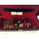 A box of vintage costume jewellery and watches