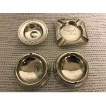 Four HM silver ashtrays