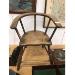 A 19th century elm child's captain's chair