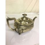 A HM silver Georgian teapot on ball feet by William Smith