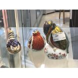 Three Royal Crown Derby birds with gold stoppers