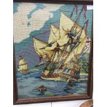 A framed tapestry of a galleon