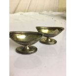 A pair of HM silver navette-shaped salts by William Frisbee,