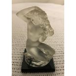 A Lalique figure on black base of a kneeling woman with flowers