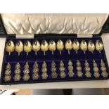 A cased set of Chinese silver spoons