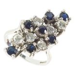 An 18ct abstract diamond and sapphire dress ring