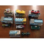 Seven boxed Scalextric cars: Green D-type Jaguar, C60 D-type Jaguar, C67 F J Lotus, C66 Cooper,