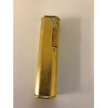 A Dunhill gold-plated lighter