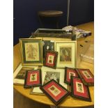 A quantity of framed photographs,