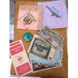 A quantity of embroidered items: RAF, HMS Renown; together with WWII maps of the Underground,