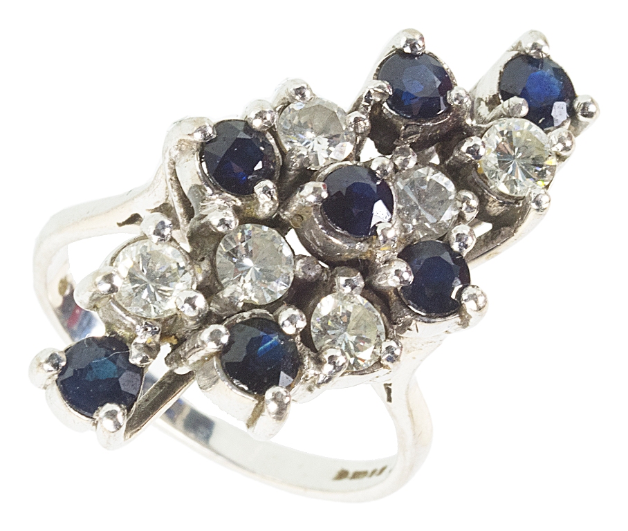 An 18ct abstract diamond and sapphire dress ring