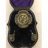 A Victorian cased silver brooch;