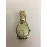 A vintage Record gold watch