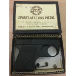 A boxed Webley starting pistol