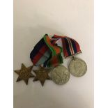 Four WWII medals to inc a France and Germany Star,