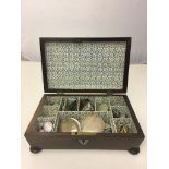A quantiy of mother-of-pearl jewellery in a vintage box