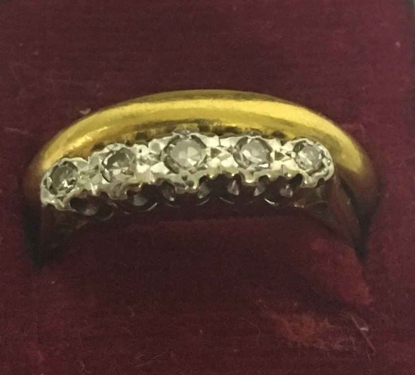 A 22ct and diamond ring