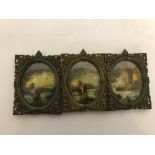 Three miniature signed oils in ornate brass frames,