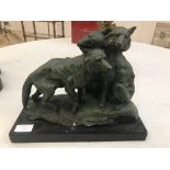 A pack of wolves on a marble base