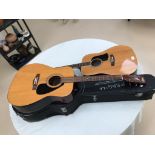 Two acoustic guitars,