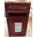 A cast-iron letter box