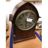 An arch-cased mantel clock