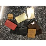 A quantity of leather wallets;