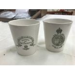 A pair of Royal commemorative Royal Doulton Edward VII beakers