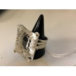 A silver and large rock crystal dress ring